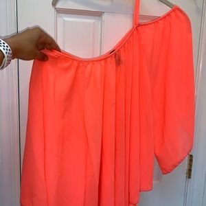 One shoulder sleeve blouse.